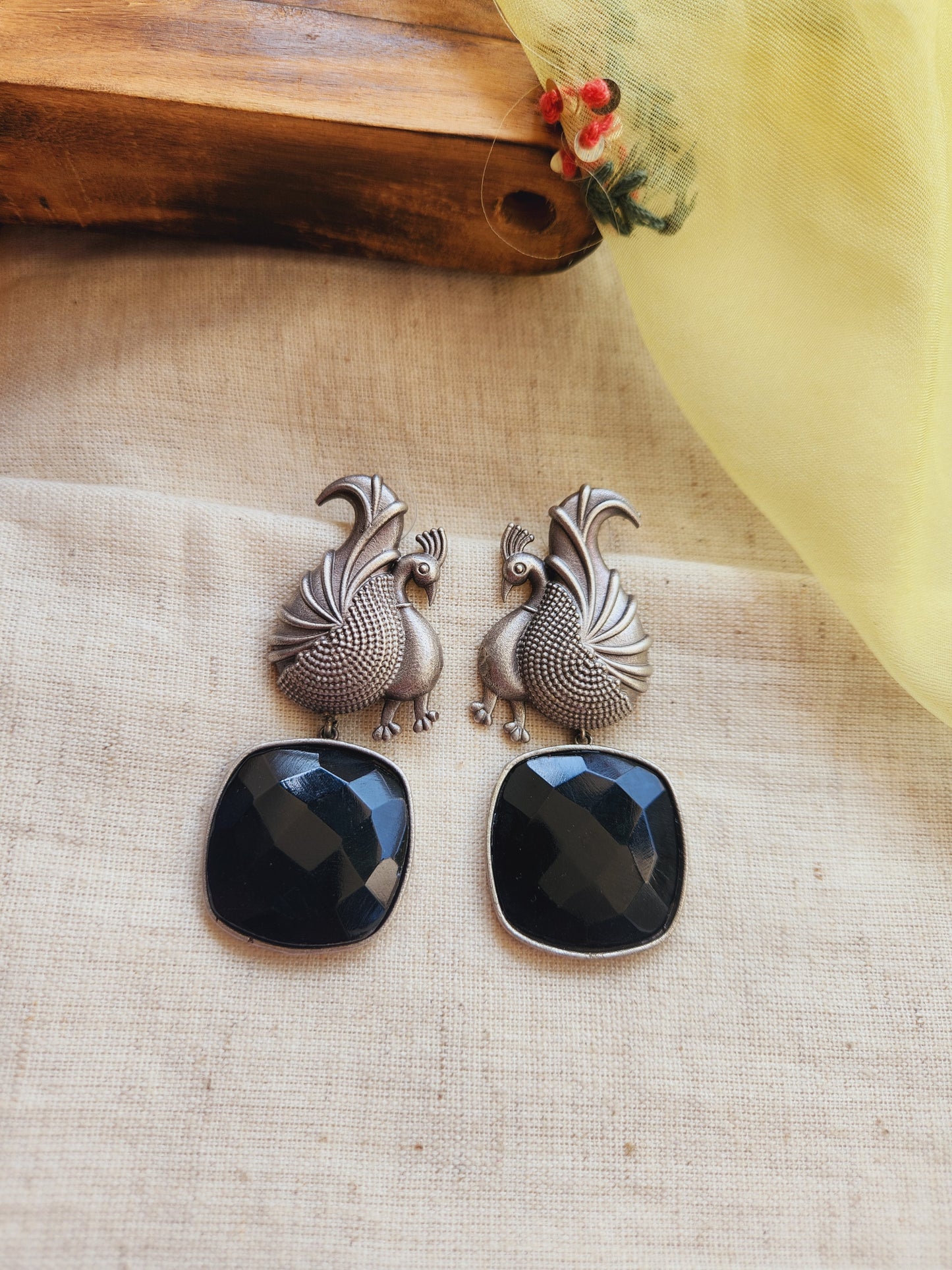 Moh peacock danglers