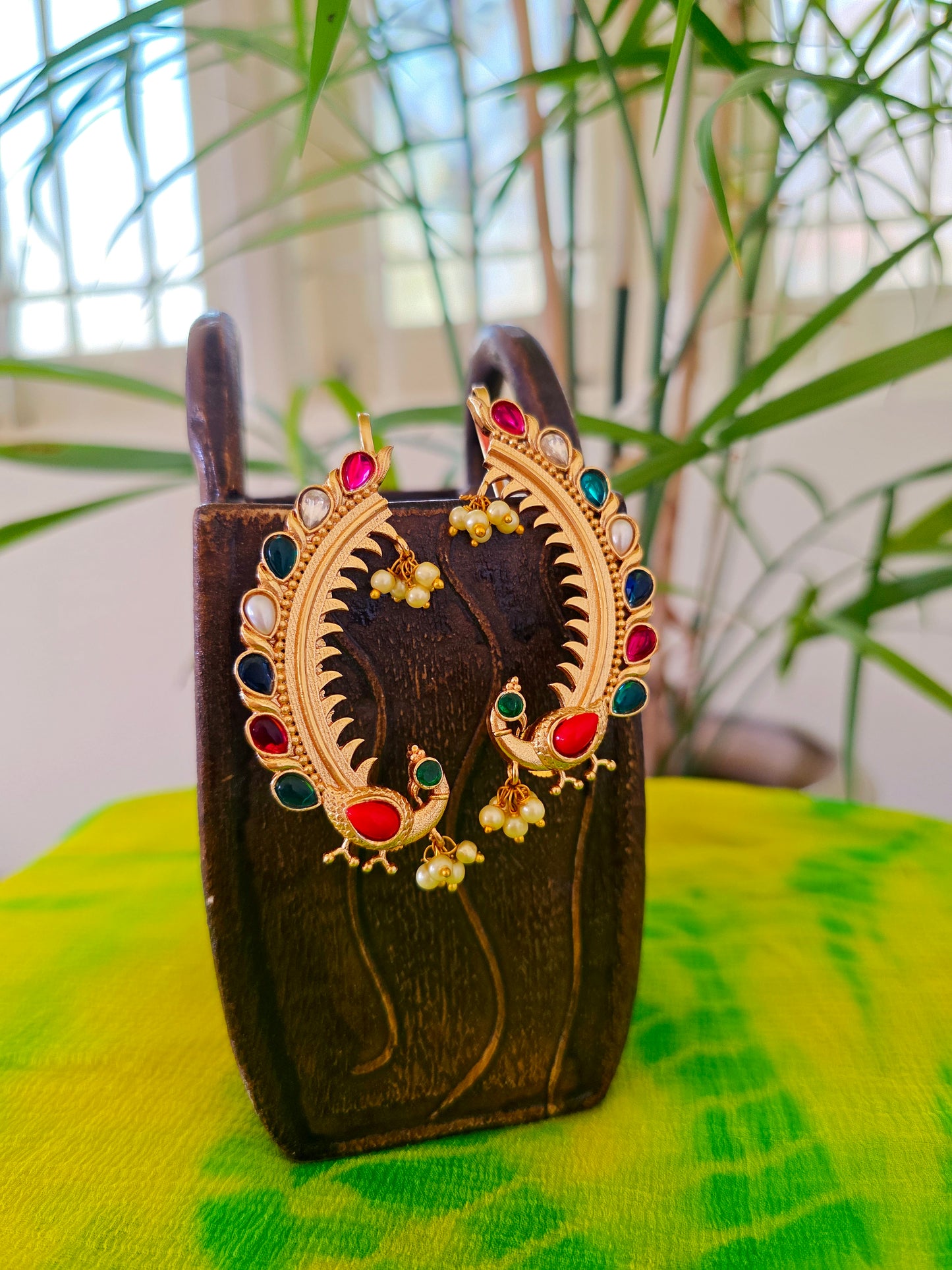 Peacock gold earcuff