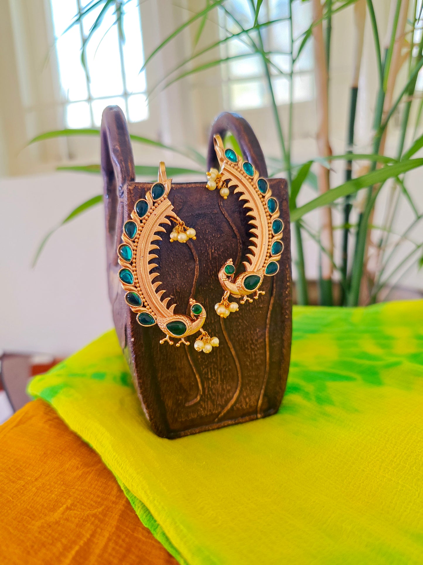 Peacock gold earcuff