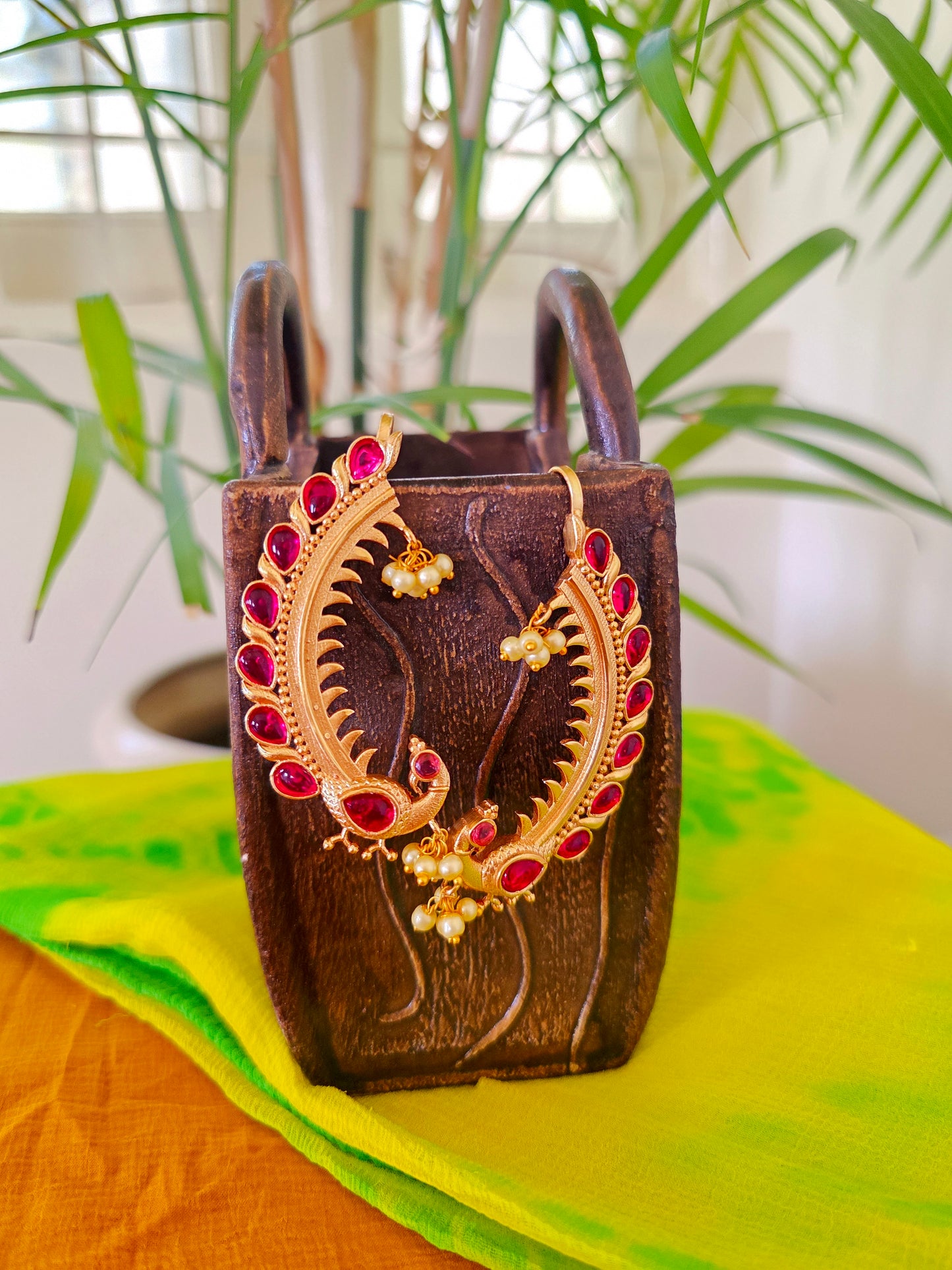 Peacock gold earcuff