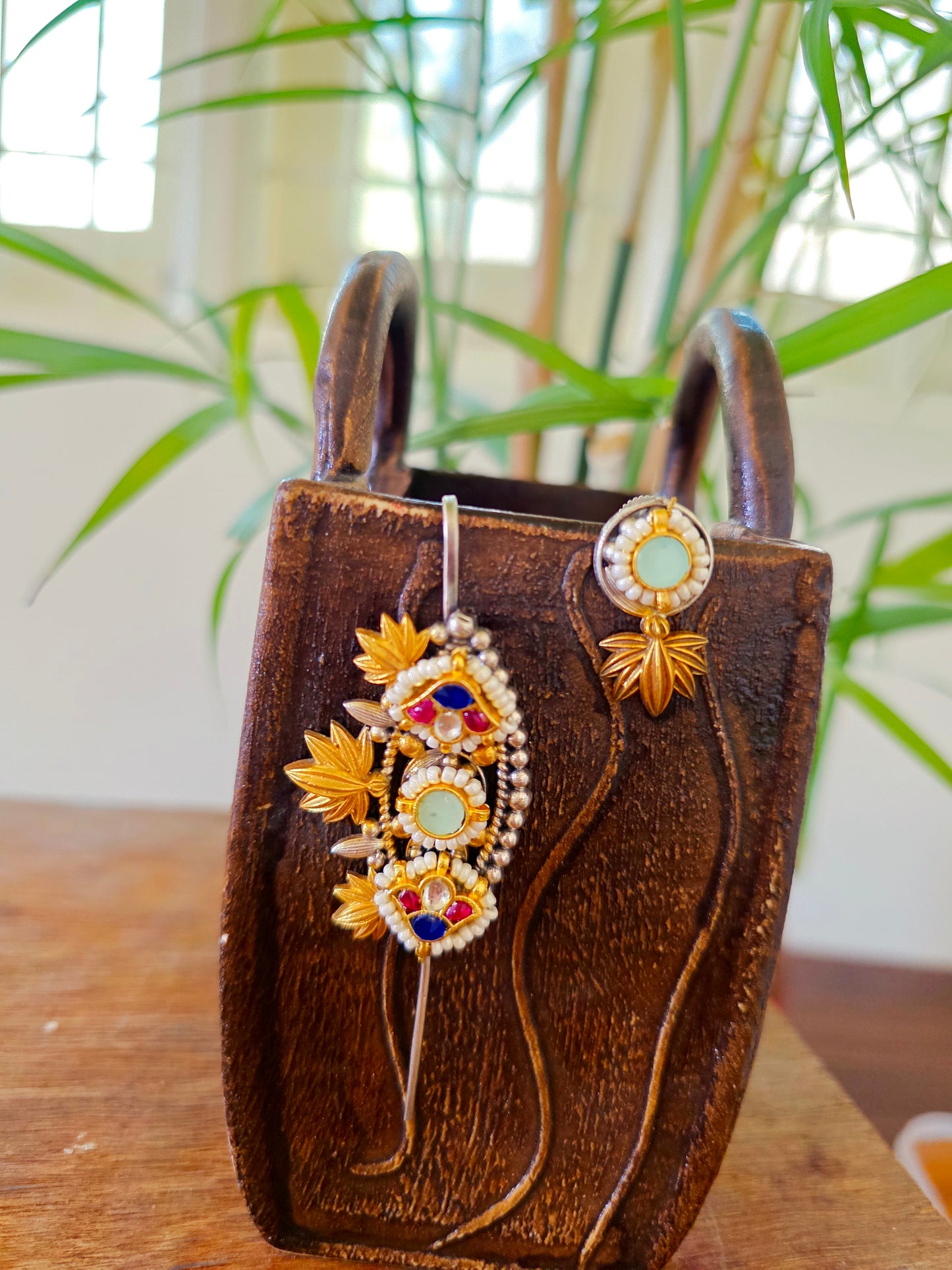 Charmi Leaf needle mismatch earcuffs