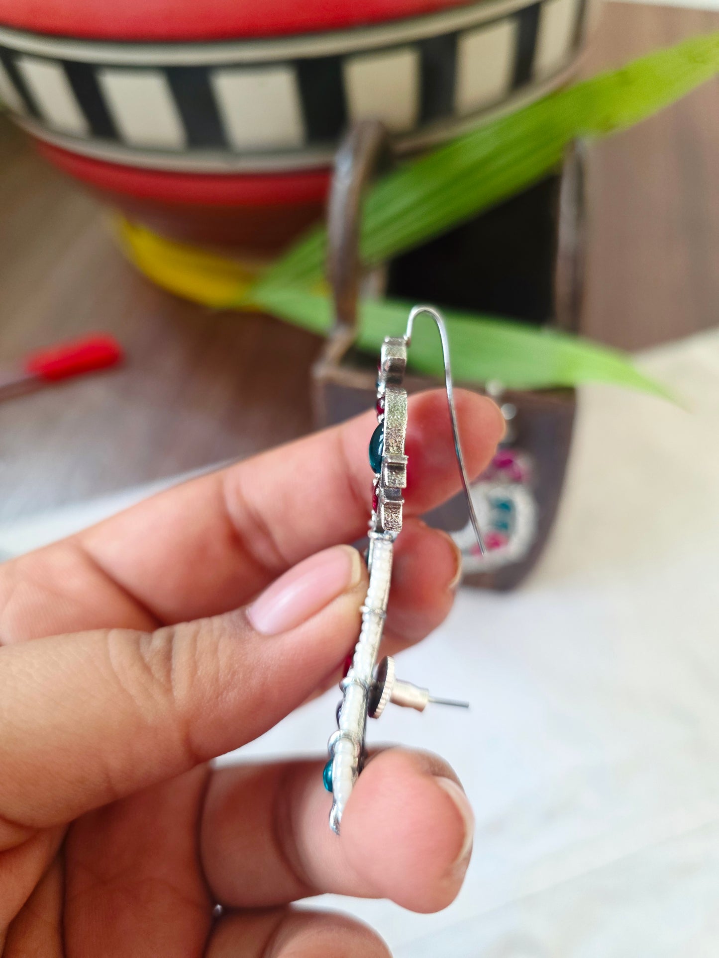 Silver peacock earcuffs