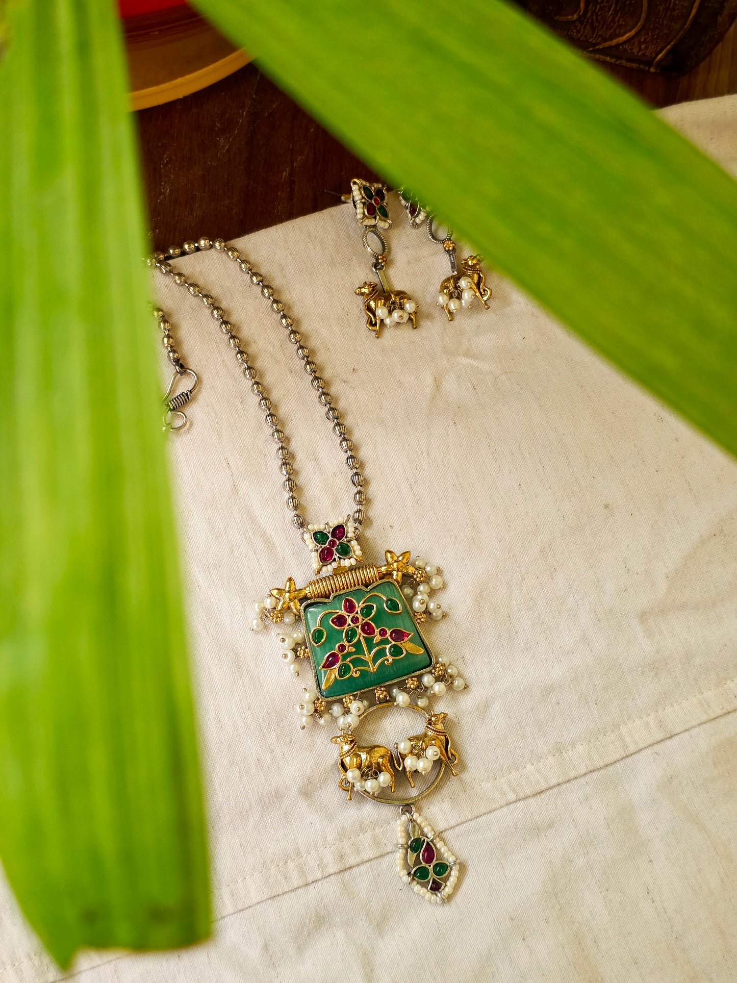 Akshara Dual tone nandi necklace