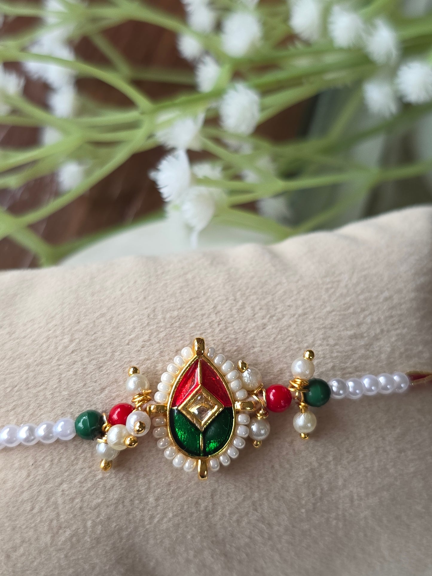 Red green white moti rakhi