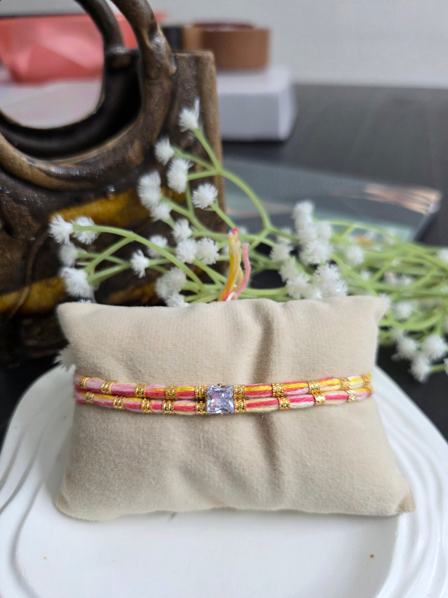 Pastel single stone rakhi