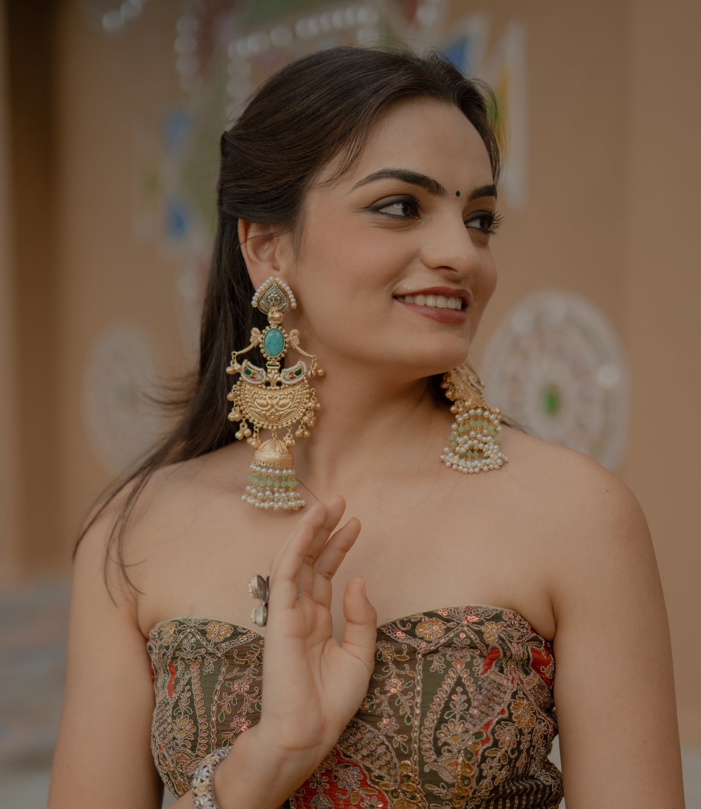 Amogh gold jhumkas