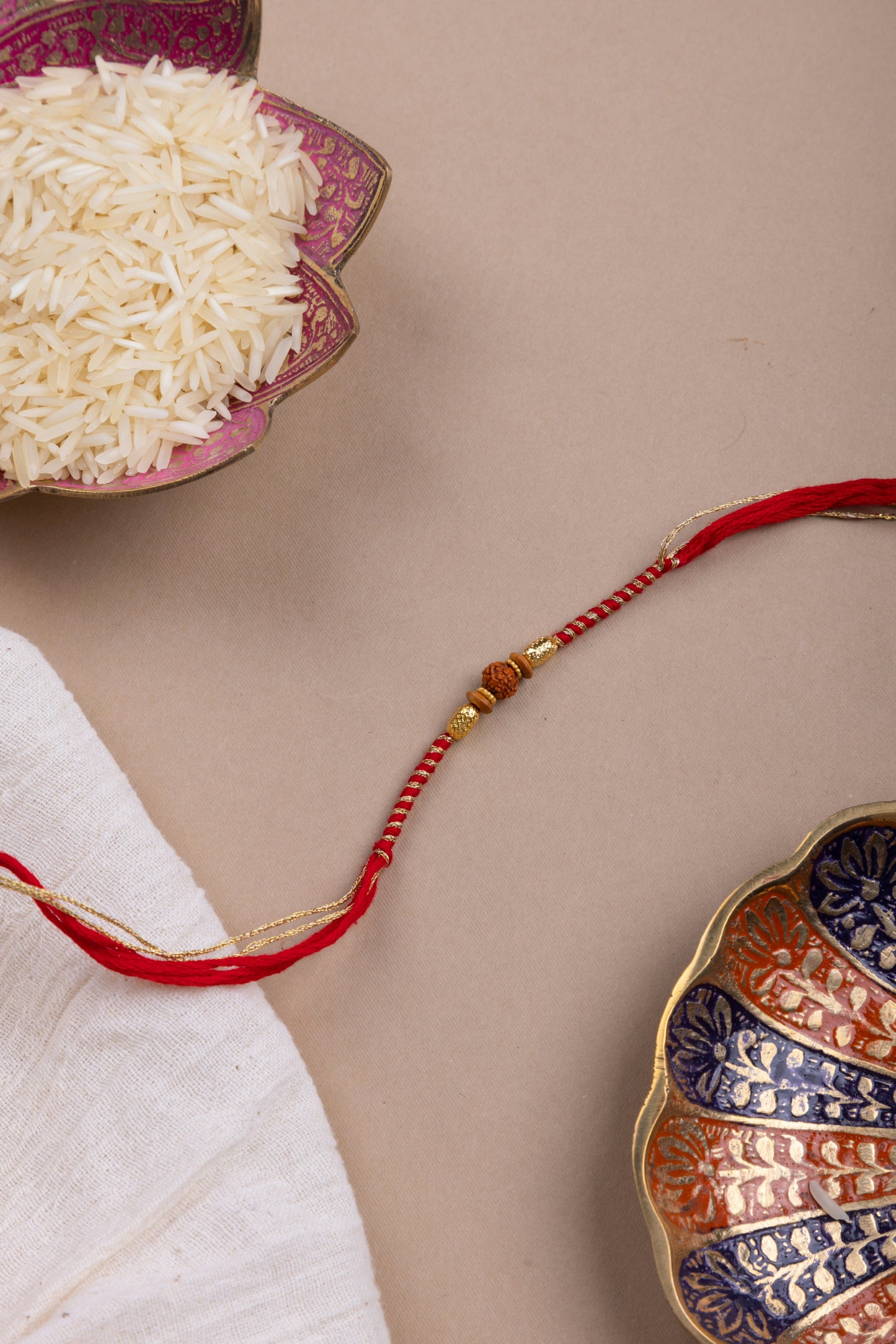 Gold weave rudraksh rakhi