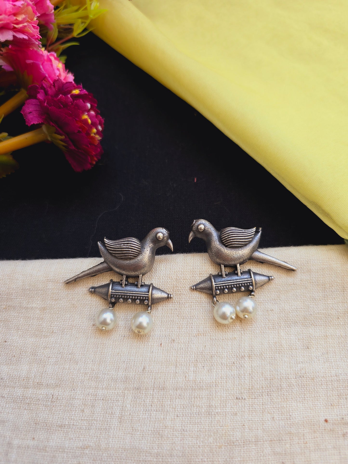 Antique bird studs