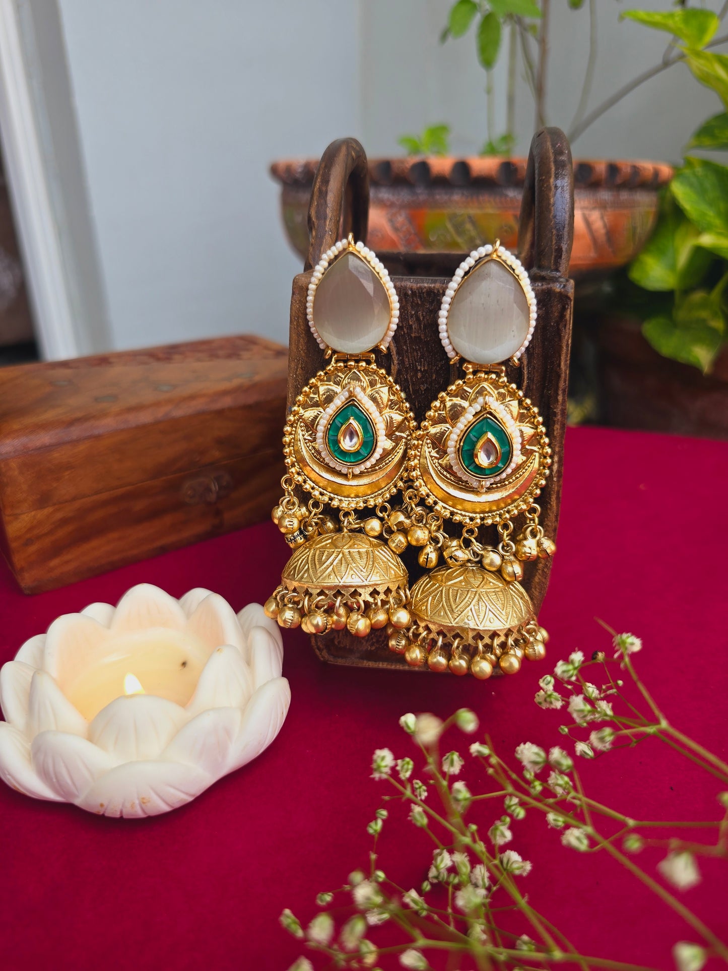 Isha gold jhumkas