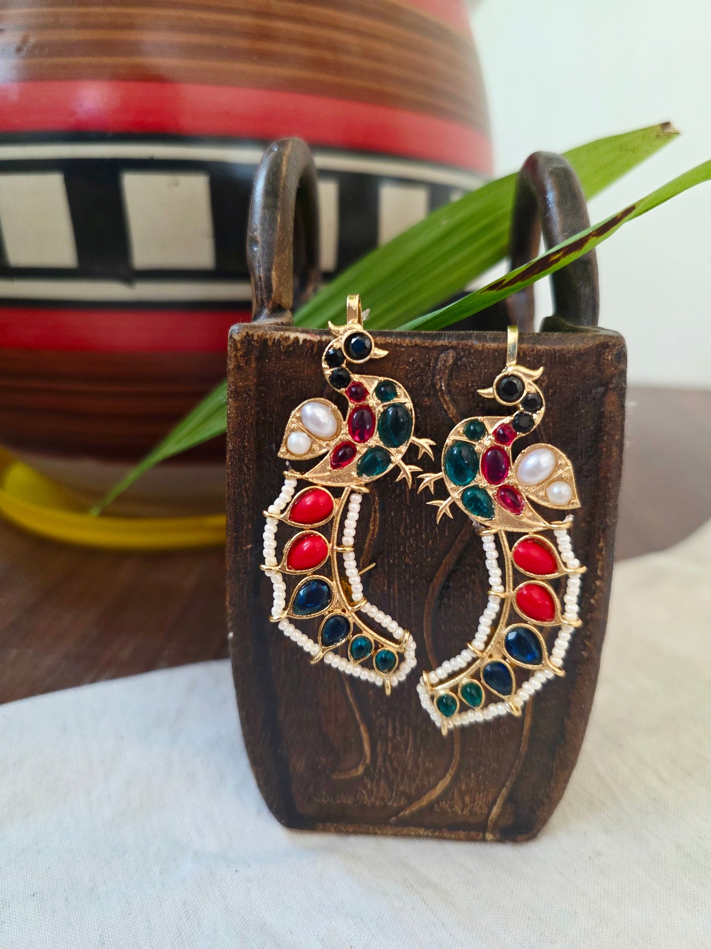 Peacock gold earcuff