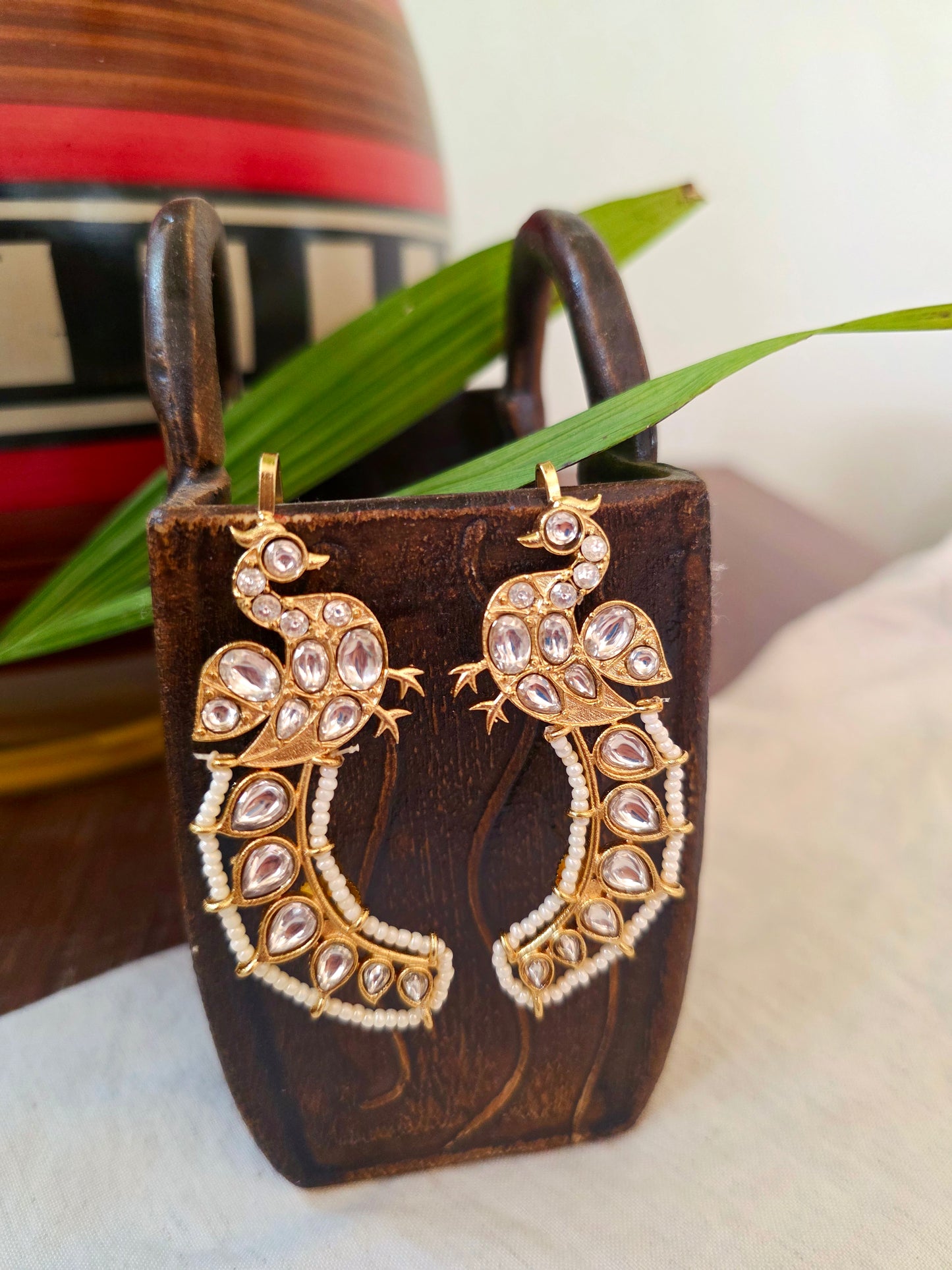 Peacock gold earcuff