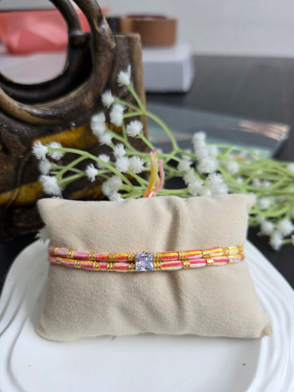 Pastel single stone rakhi