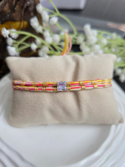 Pastel single stone rakhi