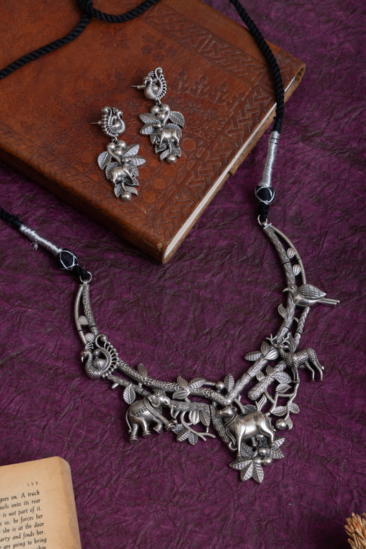 Paridhi antique silver tribal forest motif hasli choker
