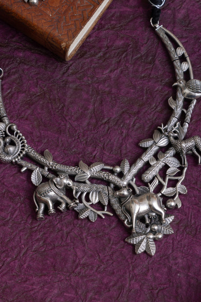 Paridhi antique silver tribal forest motif hasli choker