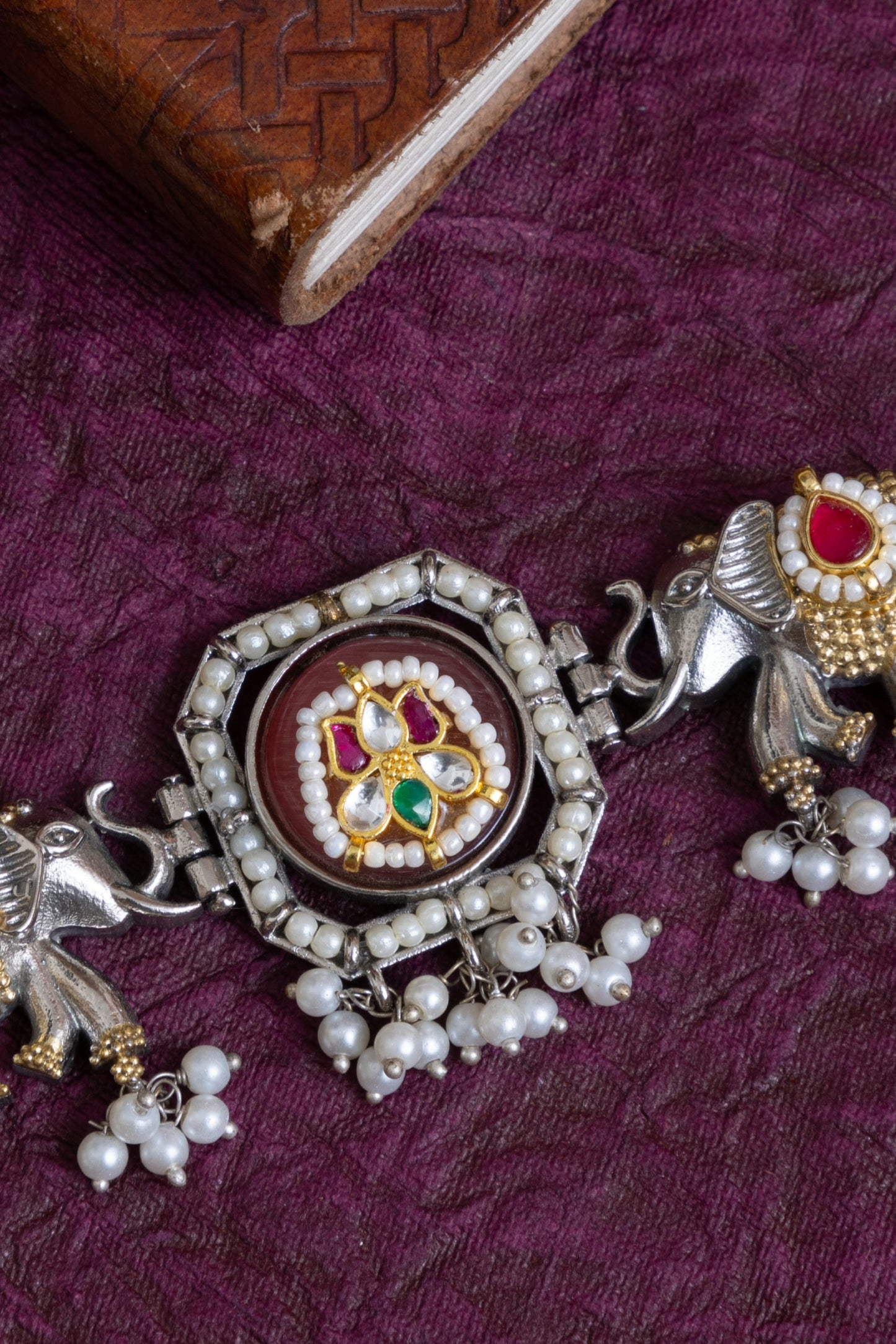 Sanu pachi kundan elephant choker with earrings