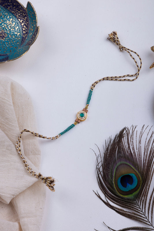 Pearl & turquoise stone thread weave rakhi