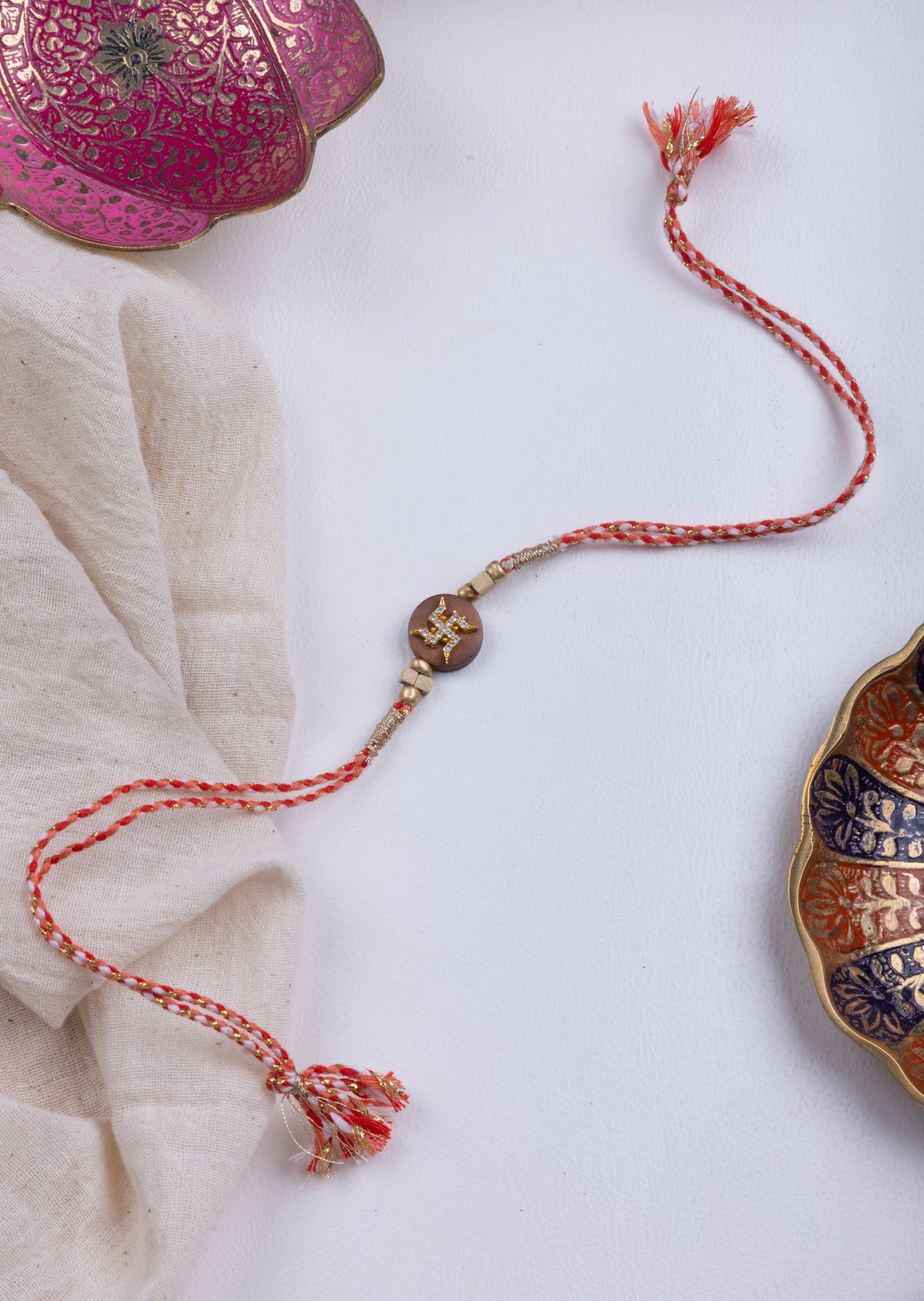 Swastik wooden diamond rakhi