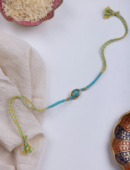 Turquoise thread weave rakhi