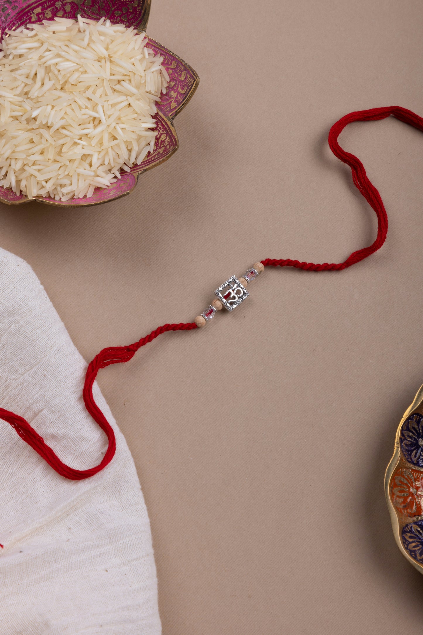 Crystal beads om rakhi