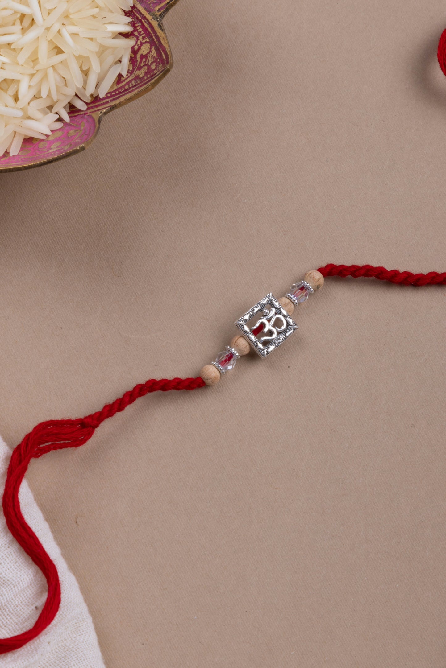 Crystal beads om rakhi