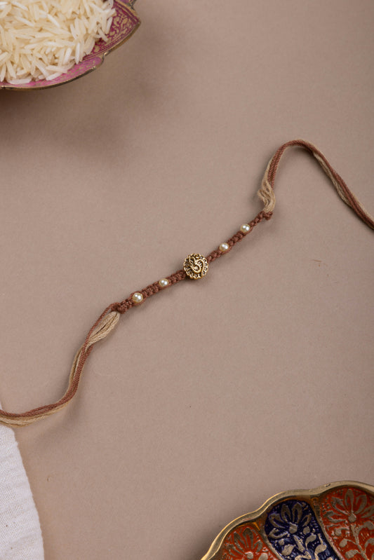 Brown thread weave om rakhi