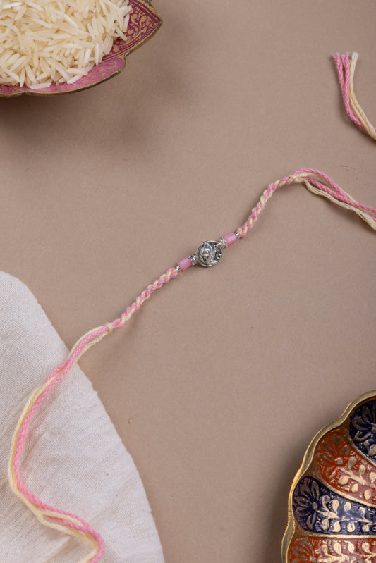 Pink feather coin rakhi