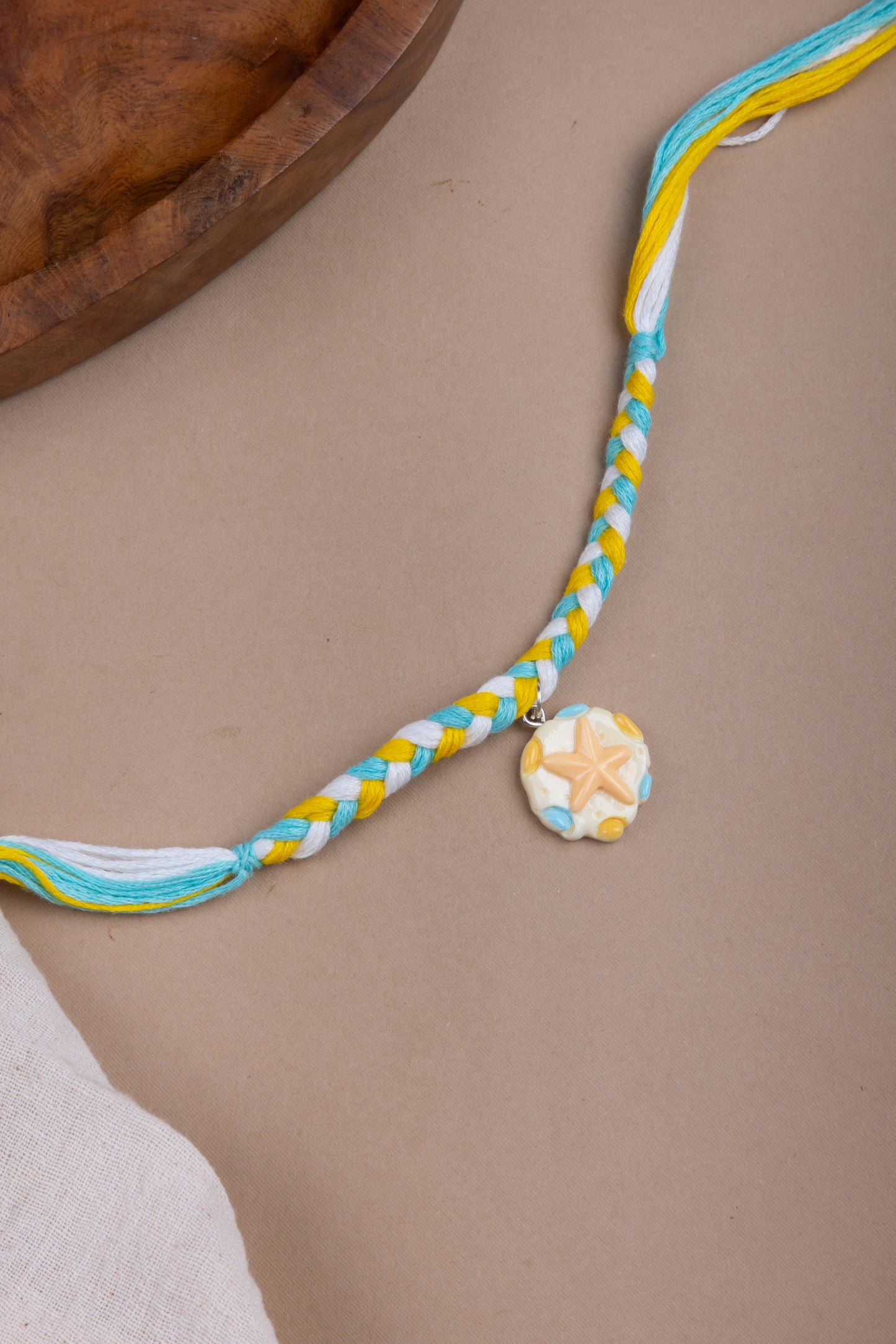 Star fish charm kids rakhi
