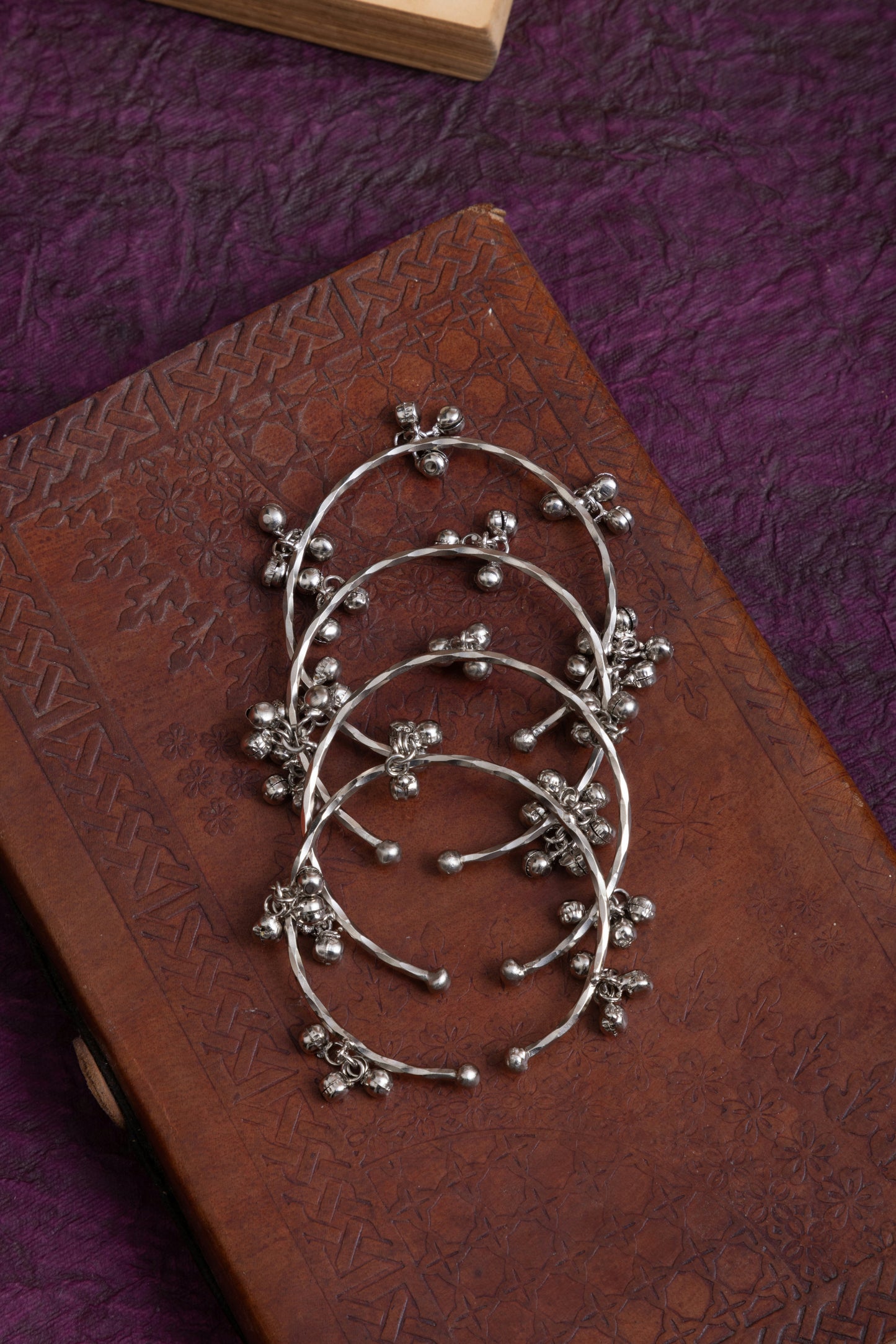 Silver lookalike ghunghroo bangles set of 4
