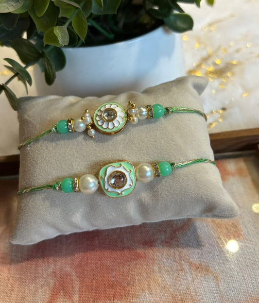 Pista meenakari couple rakhi